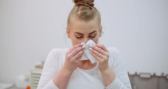 Sneezing Woman Has Coronavirus Symptoms