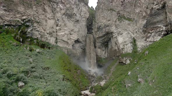 Dirty Waterfall Sultan High in the Mountains Near Elbrus in Summer