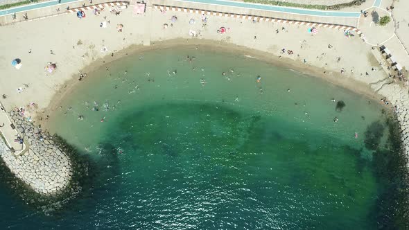 Sunny Day and People On The Beach