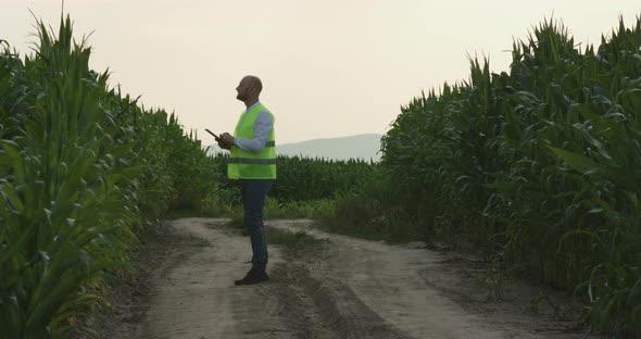Agronomist uses digital technologies for best results. Farming, ecology
