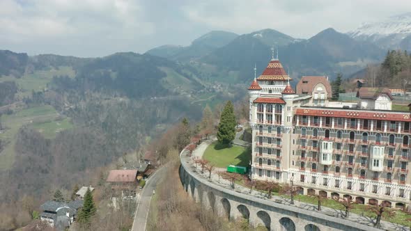 Cinematic aerial reveal of the Swiss Hotel Management School. A beautiful hospitality school located