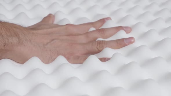 Mattress foam peak and valley checking slow-mo 1080p HD   video - Orthopedic exaggerated  inspecting