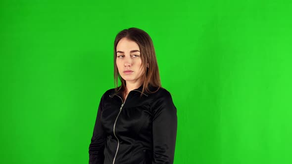 The Sad Girl Sighs Heavily. Green Screen