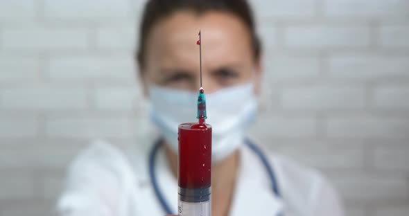 Science Lab with Blood Syringe