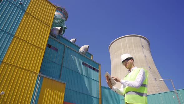 Engineer working with his tablet.