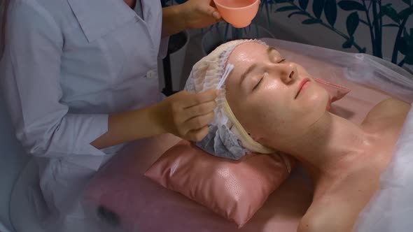 Facial Procedure At Beauty Treatment Salon