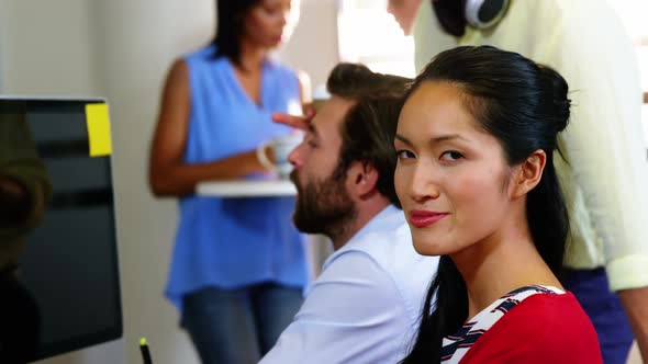 Portrait of businesswoman sitting in office