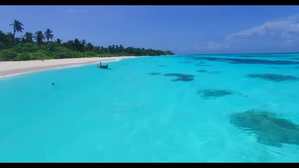 Aerial view panorama of luxury tourist beach holiday by blue ocean with white sand background of a d