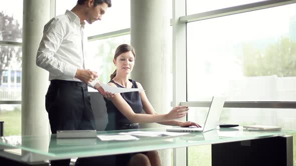 Colleagues working together in office