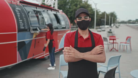 Portrait of Male Worker of Street Food Truck in Face Mask