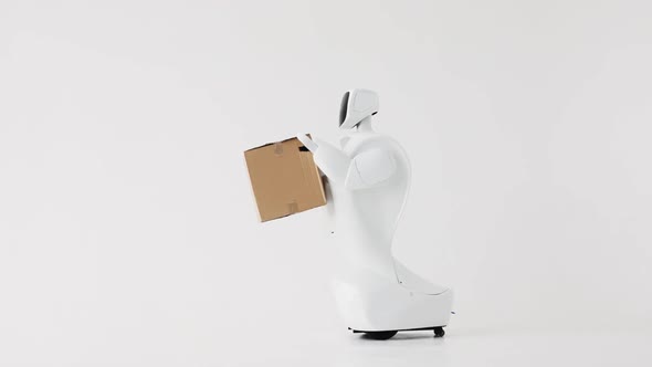 Humanoid Autonomous Robot with Cardboard Box in Hand. Cybernetic System Today. Modern Robotic