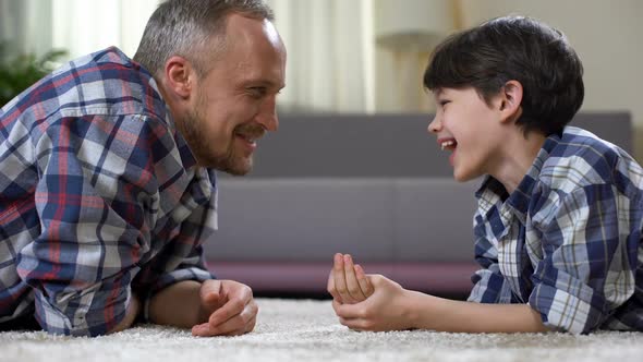 Dad and Son Laughing Together, Making Contact Kid, Single Father, Having Fun