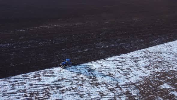 Aerial view of the Tractor Cultivated Snowy Land