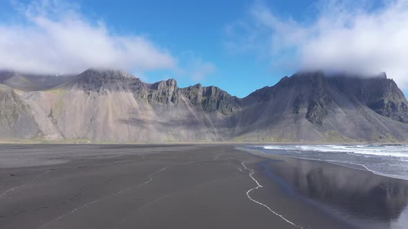 Flying Over a Sandy Beach on the Atlantic Ocean Coast.  Hofn, Iceland. Aerial Drone View