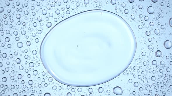 Super Slow Motion Macro Shot of Rippling Real Water Blobs at 1000Fps alt