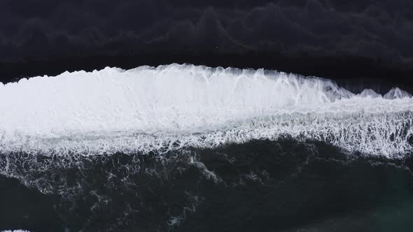Drone View Of White Tide On Black Sand Beach