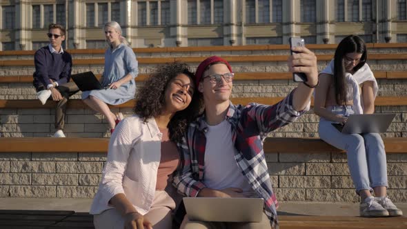 Group of Students in Front of University Taking Selfie