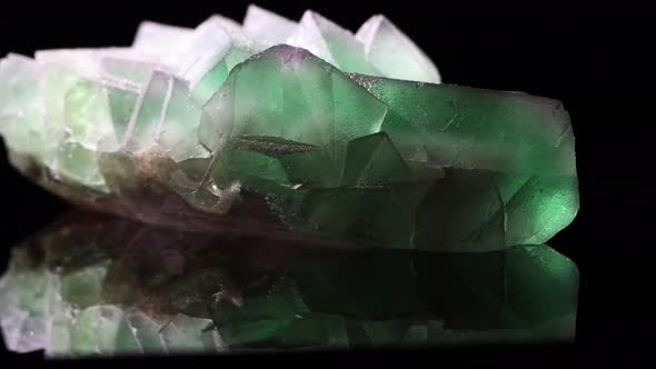 A giant fluorite crustal, green with clear sections. beautifully formed showing cubic crystals.