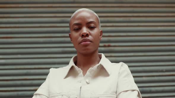 Slow motion shot of proud woman wearing denim jacket