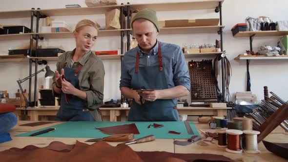 Two Colleagues in Leather Workshop