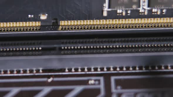 Computer Assembling a DDR 4 Ram Latch is Plugged onto the Motherboard 2