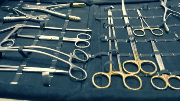 On The Table Is A Kit Of Surgical Instruments