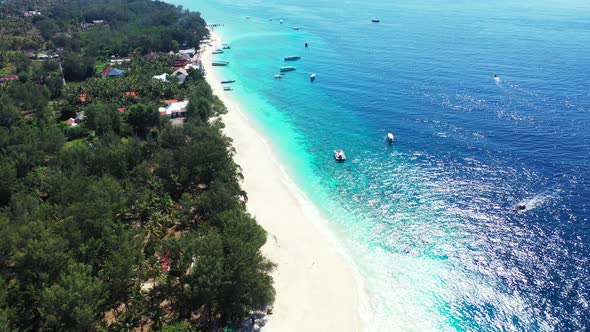 Beautiful aerial abstract shot of a white sandy paradise beach and blue ocean background in best qua