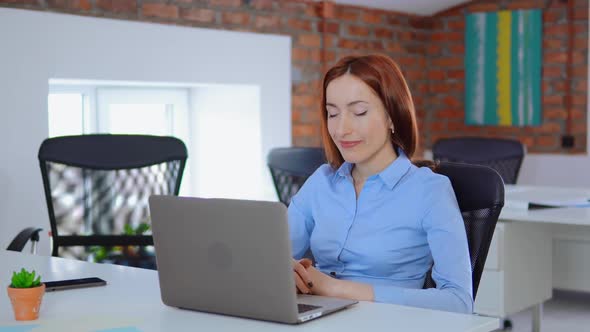 Busy Beautiful Young Woman Work on Laptop Computer