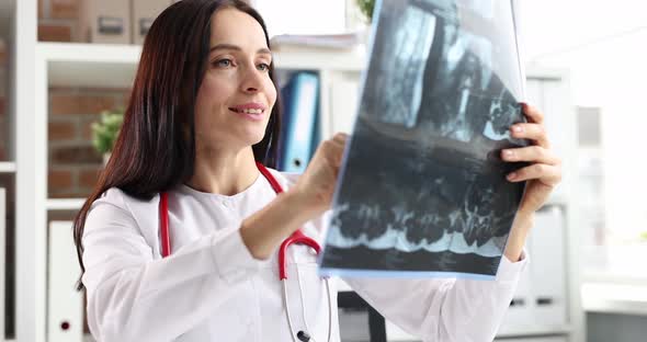 Female Doctor Examines Xray Slow Motion  Movie