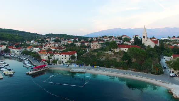 Bay town of Selca Island Brac Croatia Europe in an aerial drone shot