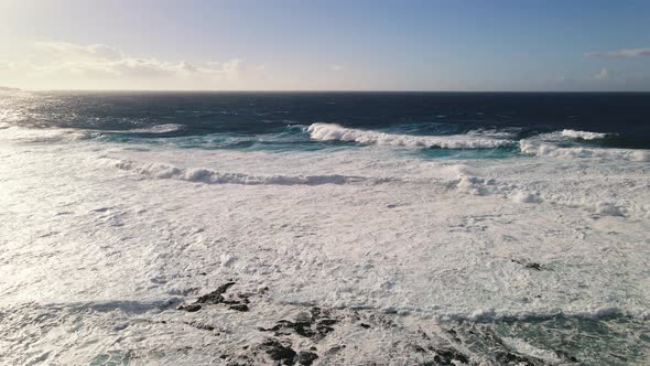 Aerial Drone View of Ocean Waves Splash Around Tenerife Canary Islands Spain