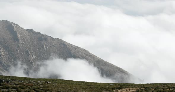 White Fluffy Clouds Moving At The Peak Of Serra Da Estrela In Portugal - Scenic View - close up