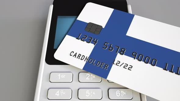 Payment Terminal with Credit Card Featuring Flag of Finland