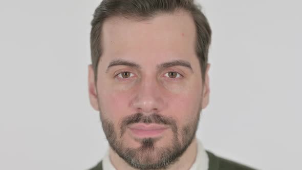 Close Up of Face of Man Looking at the Camera White Screen