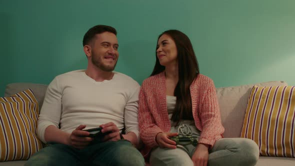 Woman and Man Are Playing Video Game