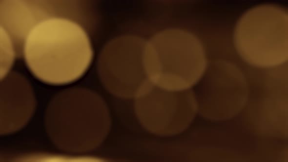 Gold Yellow Bokeh Particles Background