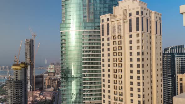 Modern Skyscrapers in Jumeirah Beach Residence in Dubai JBR Aerial Timelapse