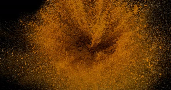 Turmeric, curcuma longa, Powder Exploding against Black Background, Indian Spice, Slow Motion 4K