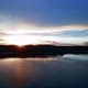 Hovering Over a Large and Big Lake at Sunset - VideoHive Item for Sale