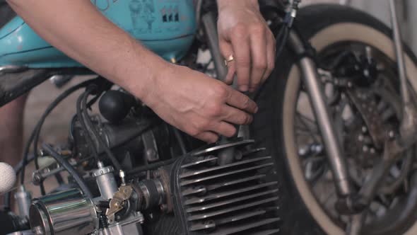 The Mechanic Man Tunes the Engine Mechanic Fixes Old Motorcycle Engine