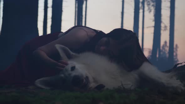 Girl caressing a dog