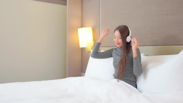 Woman use smart phone for listen music