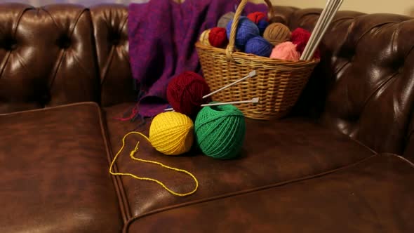 Basket with Colorful Balls of Wool