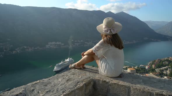 A Girl Looks From the Heights To the Boka Bay of Kotor