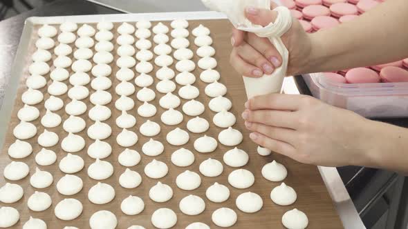  Shot of a Pastry Chef Preparing Meringues at the Kitchen