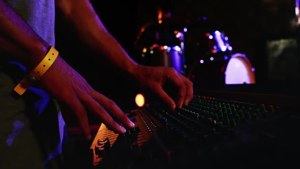 Man using dj mixer at nightclub 4k