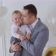 Father Holding on Hands Infant Small Child - VideoHive Item for Sale