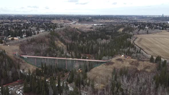 Descend over ravine facing bridge