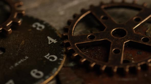 Rotating stock footage shot of antique and weathered watch faces - WATCH FACES 110