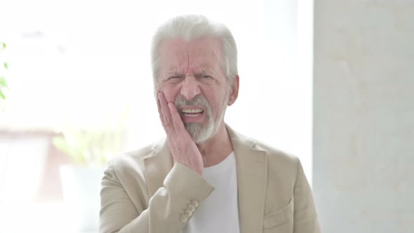 Portrait of Sick Old Man Having Toothache